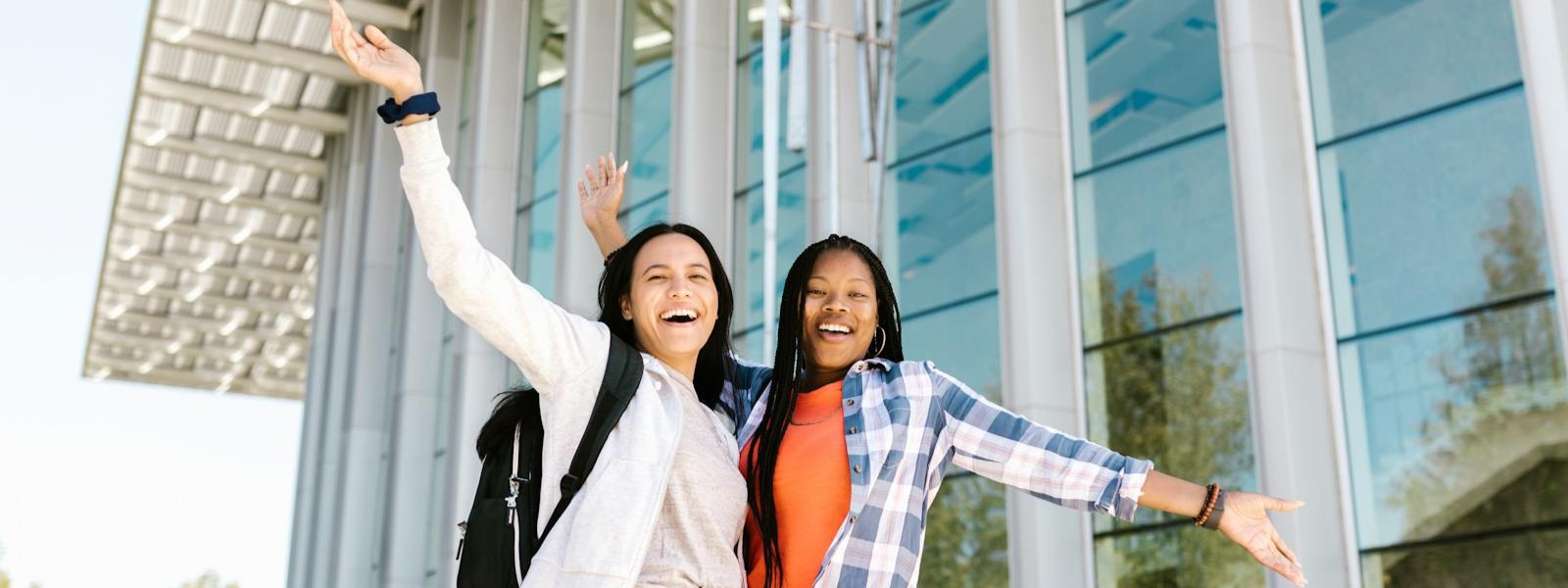 Students working on digital design projects at CUNY